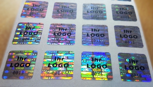hologrammetiketten, hologramm etiketten, sicherheistetiketten, hologramme mit ihrem logo, hologramm aufkleber, original, genuine, individuell, hologramm aufkleber individuell,  hologrammetiketten individuell, selbstzerstörerisch, hologramm folie, hologram